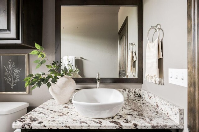 15101 Colonia Bella Dr, Edmond, OK 73013 - half bathroom featuring vanity and toilet