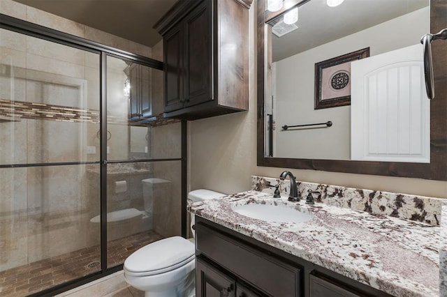 15101 Colonia Bella Dr, Edmond, OK 73013 - full bathroom with toilet, vanity, and a stall shower