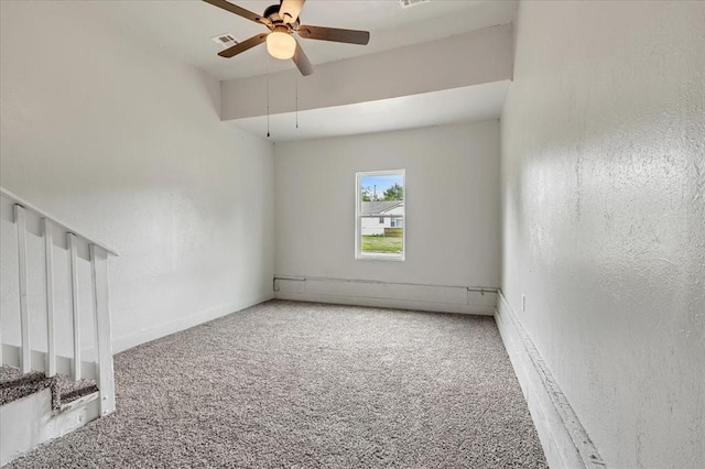 1013 Locust Ln, Midwest City, OK 73110 - carpeted empty room with ceiling fan, a textured wall, baseboards, and a baseboard radiator