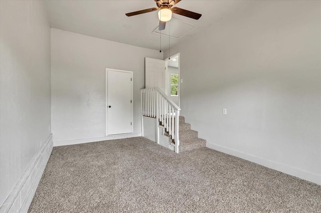 1013 Locust Ln, Midwest City, OK 73110 - spare room with a ceiling fan, carpet flooring, attic access, and baseboards