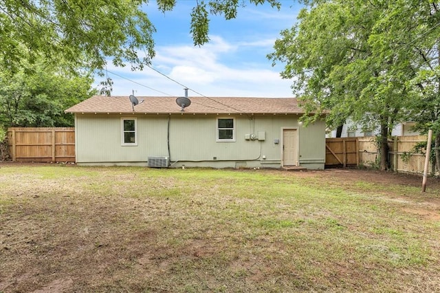 1013 Locust Ln, Midwest City, OK 73110 - rear view of house with central air condition unit