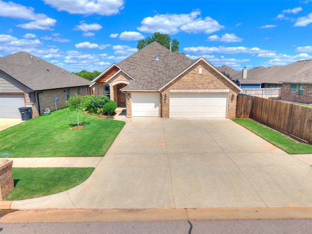 3424 Lakeside Dr, Moore, OK 73160 - traditional-style home with brick siding, a garage, and concrete driveway