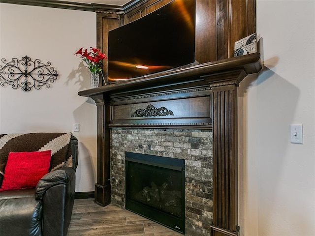 3424 Lakeside Dr, Moore, OK 73160 - detailed view of wood finished floors, a stone fireplace, and baseboards