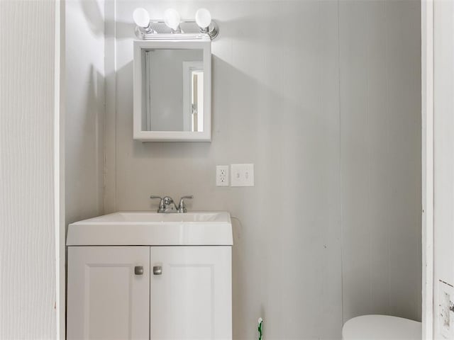 1017 N Broadway Ave, Shawnee, OK 74801 - half bath featuring vanity and toilet