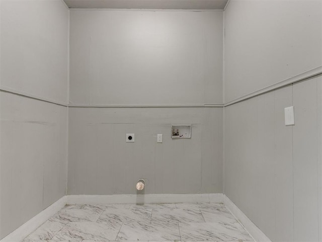 1017 N Broadway Ave, Shawnee, OK 74801 - laundry room with hookup for an electric dryer, marble finish floors, hookup for a washing machine, and baseboards