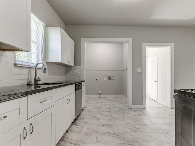 1017 N Broadway Ave, Shawnee, OK 74801 - kitchen featuring a sink, light marble finish floors, dishwasher, white cabinetry, and range