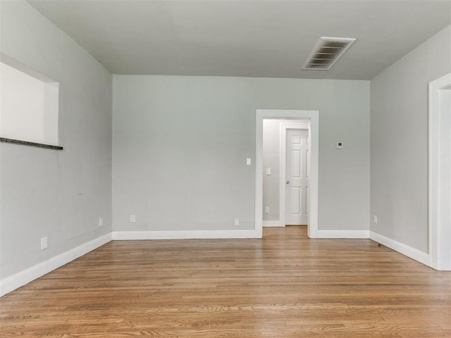 1017 N Broadway Ave, Shawnee, OK 74801 - spare room with light wood-style flooring and baseboards