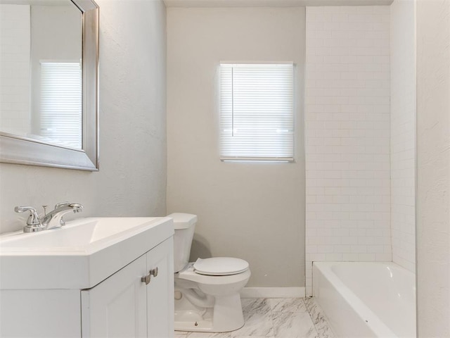 1017 N Broadway Ave, Shawnee, OK 74801 - bathroom featuring toilet, vanity, marble look tile flooring, and baseboards