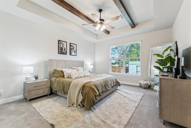 124 W 5th St, Arcadia, OK 73007 - bedroom featuring light colored carpet, a tray ceiling, beamed ceiling, and ceiling fan