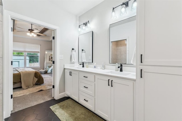 124 W 5th St, Arcadia, OK 73007 - full bath featuring connected bathroom, double vanity, a ceiling fan, and tile patterned floors