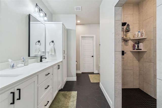 124 W 5th St, Arcadia, OK 73007 - full bathroom with double vanity, tile patterned floors, recessed lighting, and tiled shower