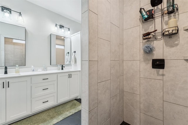 124 W 5th St, Arcadia, OK 73007 - bathroom with double vanity, tiled shower, and tile patterned flooring