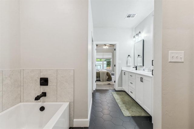 124 W 5th St, Arcadia, OK 73007 - ensuite bathroom with double vanity, a bath, tile patterned floors, and ceiling fan