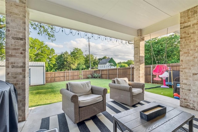 124 W 5th St, Arcadia, OK 73007 - fenced backyard with outdoor lounge area, a patio, and a grill