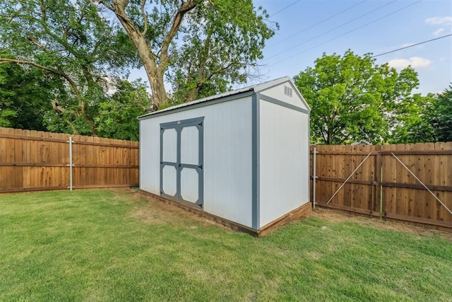 124 W 5th St, Arcadia, OK 73007 - view of shed featuring a fenced backyard