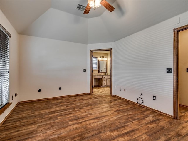 3501 Shell Ln, Yukon, OK 73099 - unfurnished room with a ceiling fan, wood finished floors, vaulted ceiling, and baseboards