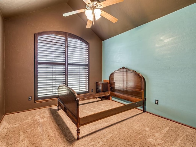 3501 Shell Ln, Yukon, OK 73099 - bedroom featuring vaulted ceiling, carpet floors, baseboards, ceiling fan, and a textured wall