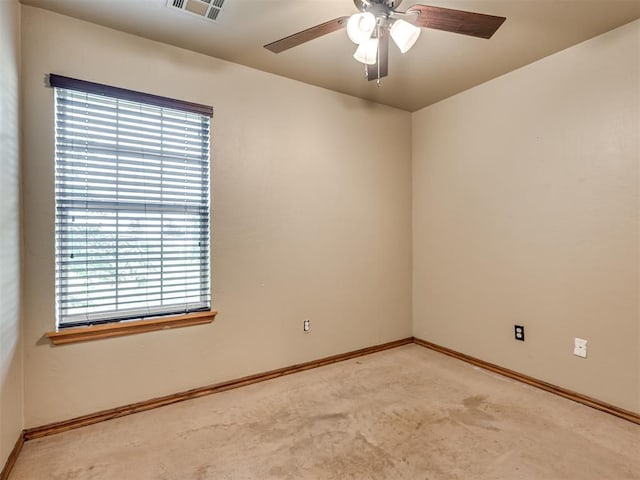 3501 Shell Ln, Yukon, OK 73099 - carpeted spare room with baseboards and a ceiling fan