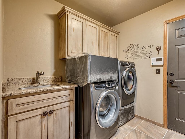 3501 Shell Ln, Yukon, OK 73099 - laundry room with cabinet space, independent washer and dryer, and baseboards