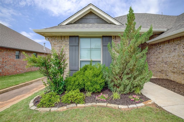 2613 Ethan Ln, Oklahoma City, OK 73160 - view of property exterior with roof with shingles and brick siding