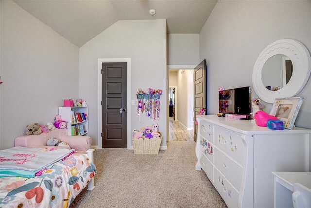 2613 Ethan Ln, Oklahoma City, OK 73160 - bedroom featuring vaulted ceiling, light carpet, and baseboards