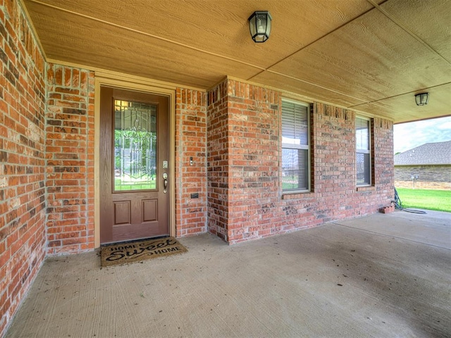 1861 Debbie Dr, Guthrie, OK 73044 - doorway to property with brick siding