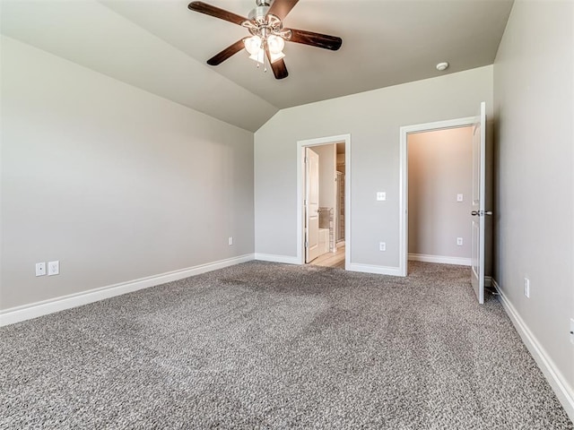 1861 Debbie Dr, Guthrie, OK 73044 - unfurnished bedroom featuring light colored carpet, baseboards, lofted ceiling, ceiling fan, and connected bathroom