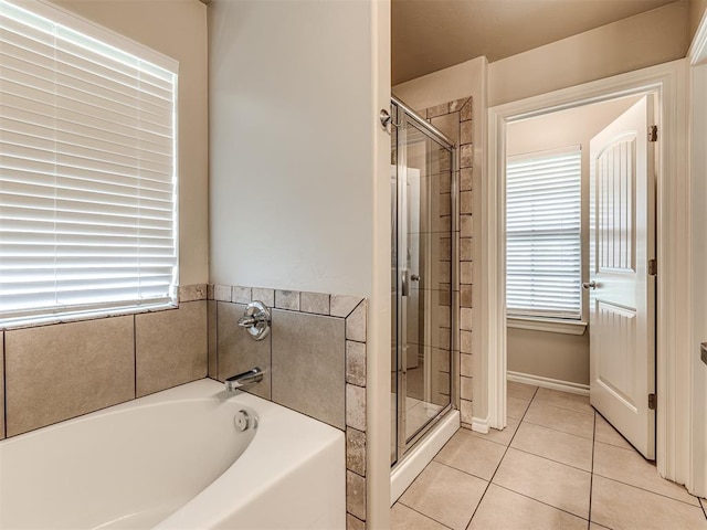 1861 Debbie Dr, Guthrie, OK 73044 - bathroom with a garden tub, a stall shower, and tile patterned floors