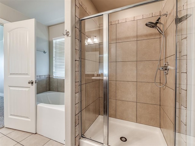 1861 Debbie Dr, Guthrie, OK 73044 - full bathroom with a stall shower, a bath, and tile patterned floors