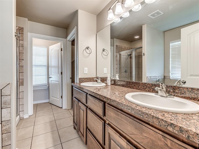 1861 Debbie Dr, Guthrie, OK 73044 - full bathroom with a shower stall, tile patterned floors, and double vanity