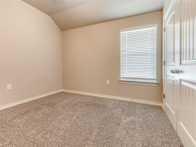 1861 Debbie Dr, Guthrie, OK 73044 - carpeted empty room with lofted ceiling and baseboards