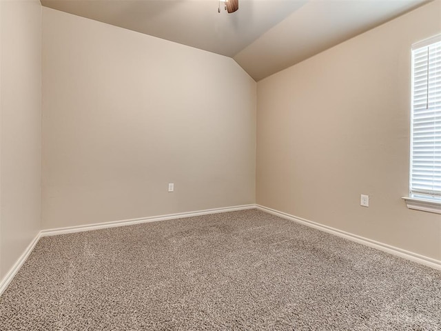 1861 Debbie Dr, Guthrie, OK 73044 - empty room with carpet flooring, lofted ceiling, ceiling fan, and baseboards