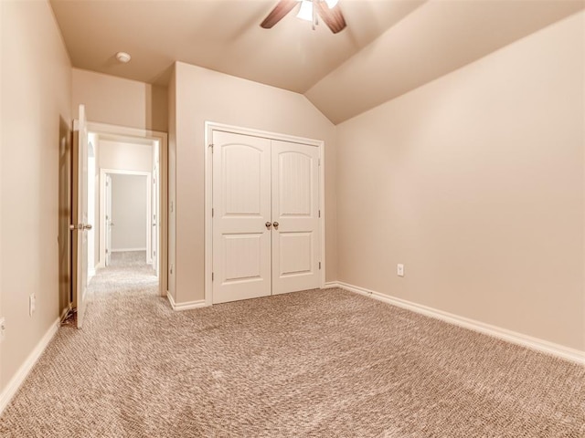 1861 Debbie Dr, Guthrie, OK 73044 - unfurnished bedroom with light colored carpet, a closet, baseboards, vaulted ceiling, and a ceiling fan