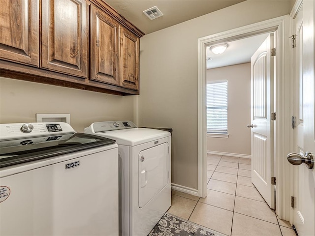 1861 Debbie Dr, Guthrie, OK 73044 - washroom with cabinet space, separate washer and dryer, light tile patterned floors, and baseboards