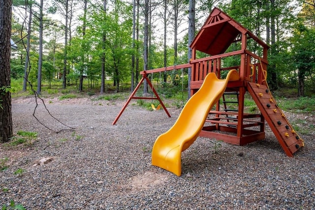 193 Pine Forest Trl, Broken Bow, OK 74728 - view of play area with view of scattered trees