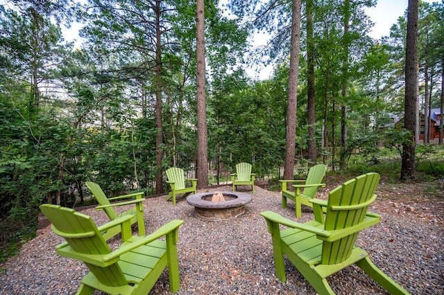 193 Pine Forest Trl, Broken Bow, OK 74728 - view of yard with an outdoor fire pit