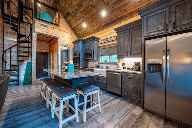 193 Pine Forest Trl, Broken Bow, OK 74728 - kitchen featuring stainless steel appliances, wood ceiling, high vaulted ceiling, a center island, and dark wood-type flooring