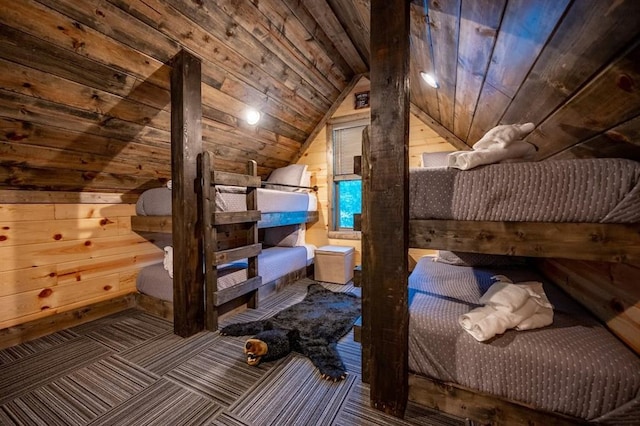 193 Pine Forest Trl, Broken Bow, OK 74728 - bedroom with wood walls, wooden ceiling, and lofted ceiling