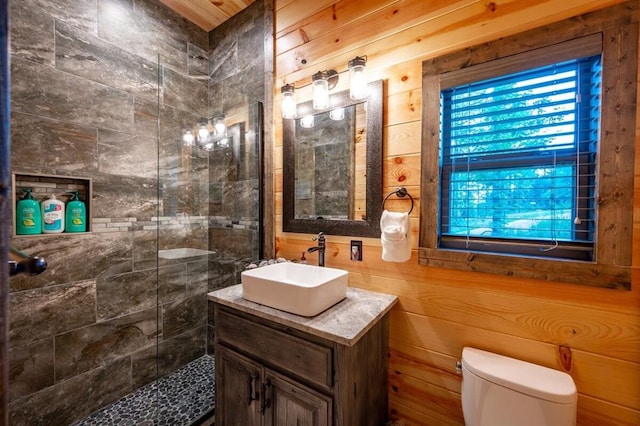 193 Pine Forest Trl, Broken Bow, OK 74728 - bathroom featuring vanity, toilet, and a tile shower