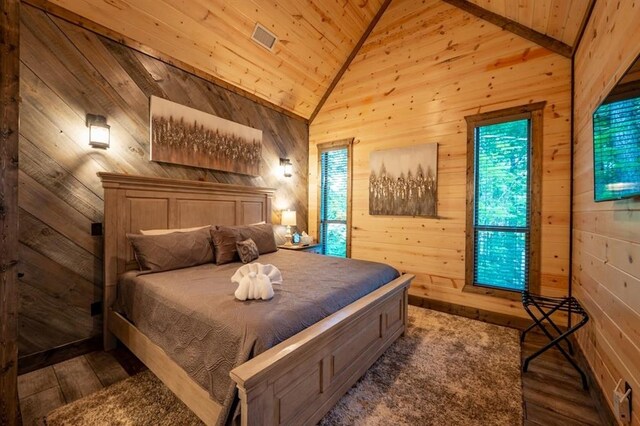 193 Pine Forest Trl, Broken Bow, OK 74728 - bedroom featuring wooden walls, wood finished floors, wooden ceiling, and high vaulted ceiling