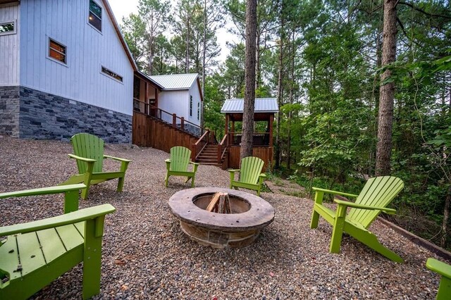 193 Pine Forest Trl, Broken Bow, OK 74728 - view of yard with a fire pit and stairway