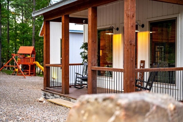 193 Pine Forest Trl, Broken Bow, OK 74728 - wooden terrace with a playground