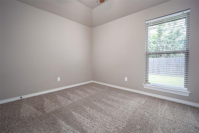 7521 Prairie Twyne Dr, Yukon, OK 73099 - carpeted empty room with baseboards and ceiling fan