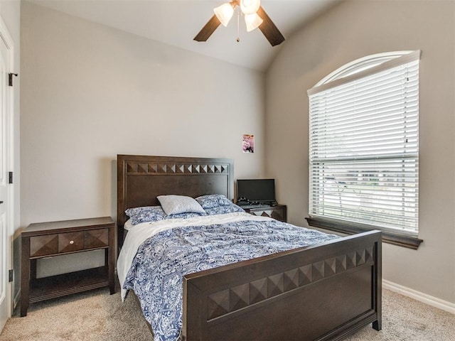 11728 SW 15th Ter, Yukon, OK 73099 - bedroom with carpet flooring, vaulted ceiling, baseboards, and a ceiling fan