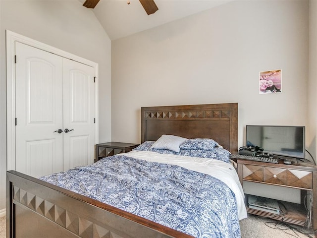 11728 SW 15th Ter, Yukon, OK 73099 - bedroom with carpet, vaulted ceiling, a closet, and a ceiling fan