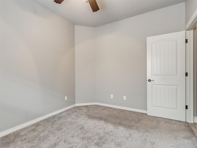 11728 SW 15th Ter, Yukon, OK 73099 - spare room with carpet floors, a ceiling fan, baseboards, and lofted ceiling