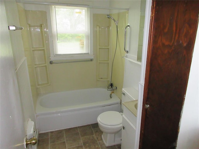 608 W Walnut St, Tecumseh, OK 74873 - bathroom featuring toilet, bathtub / shower combination, and vanity