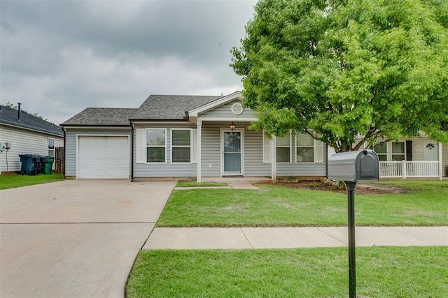1705 NW 147th St, Edmond, OK 73013 - view of front facade featuring a garage, concrete driveway, a front lawn, and roof with shingles