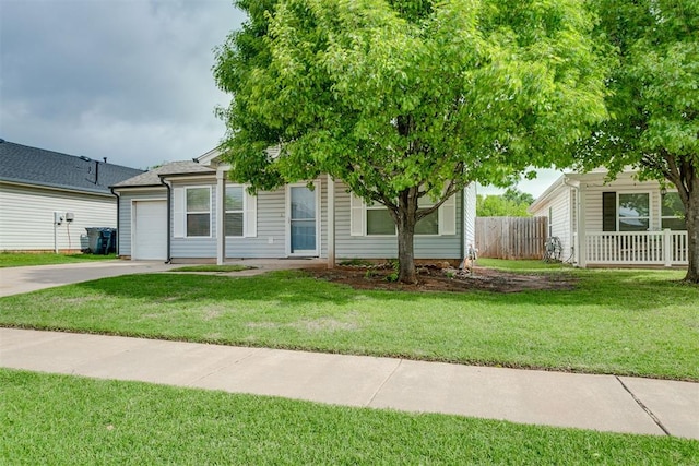 1705 NW 147th St, Edmond, OK 73013 - obstructed view of property featuring driveway and an attached garage
