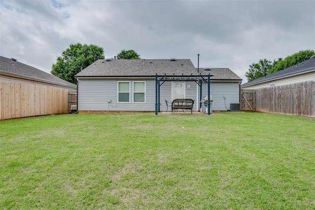 1705 NW 147th St, Edmond, OK 73013 - back of property featuring a pergola, cooling unit, a patio area, and a shingled roof